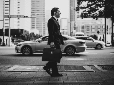 Senior business man moments on the streets of Tokyo
